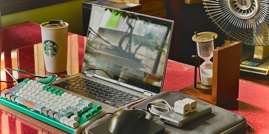 A laptop computer sitting on top of a desk