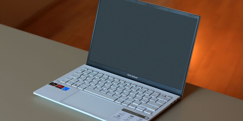 A laptop computer sitting on top of a table