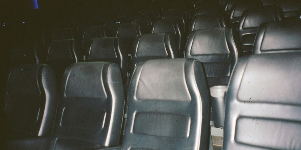 a row of empty seats in an auditorium