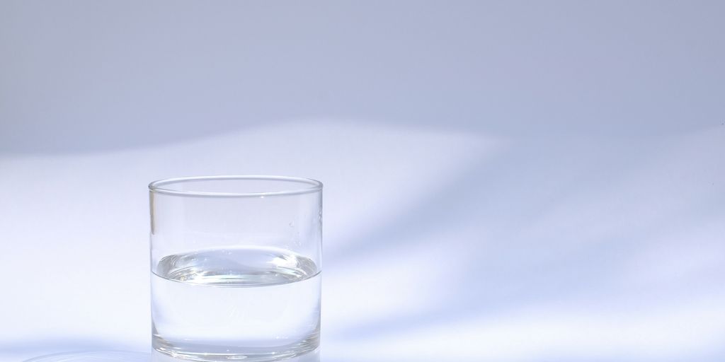 clear drinking glass filled with water
