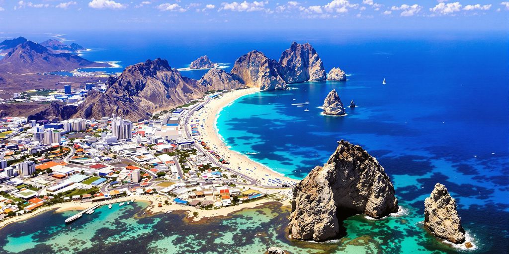 Aerial view of Cabo San Lucas with beaches and water.