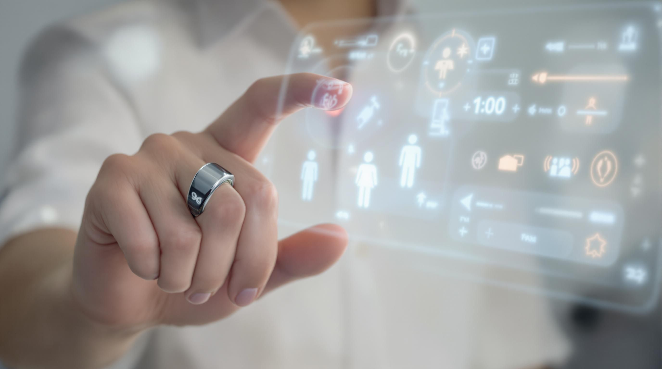 Hand making gesture to control technology.