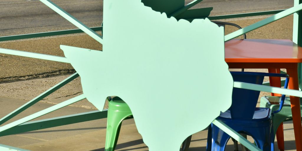 a group of colorful chairs sitting next to each other