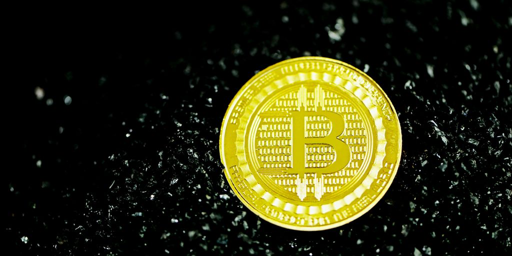 gold and silver round coin