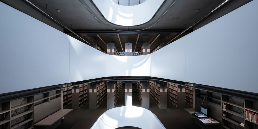 a room with a lot of books on shelves