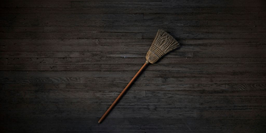 brown and black brush on brown wooden table