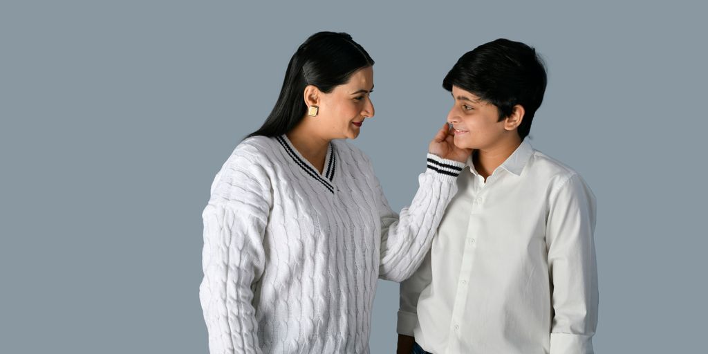 a man and woman looking at each other