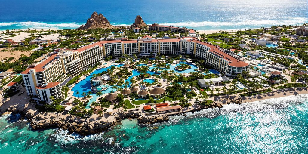 Aerial view of Secrets Los Cabos Resort and ocean.
