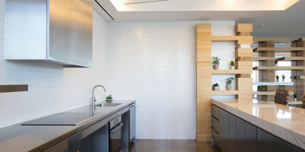 a kitchen with white cabinets