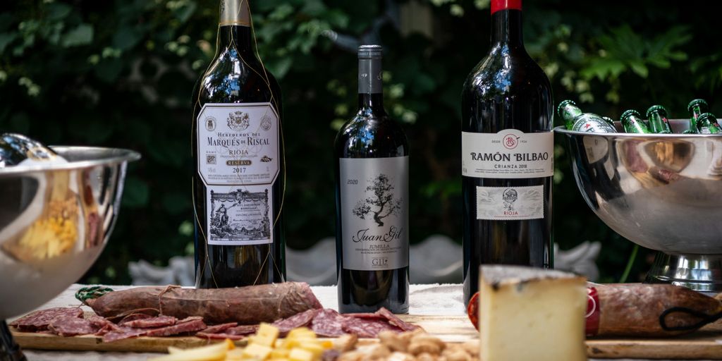 a group of bottles and a plate of food