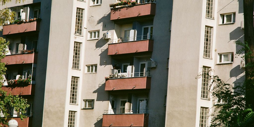 a row of buildings with balconies and balconies
