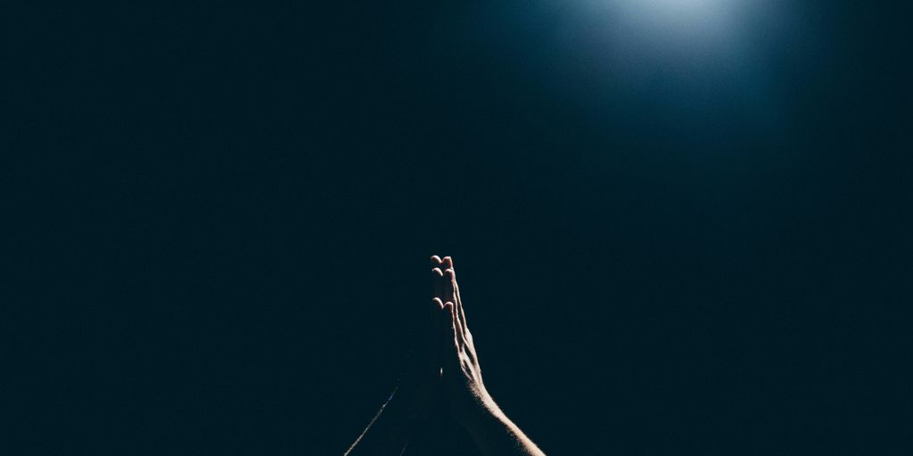 person raising arms
