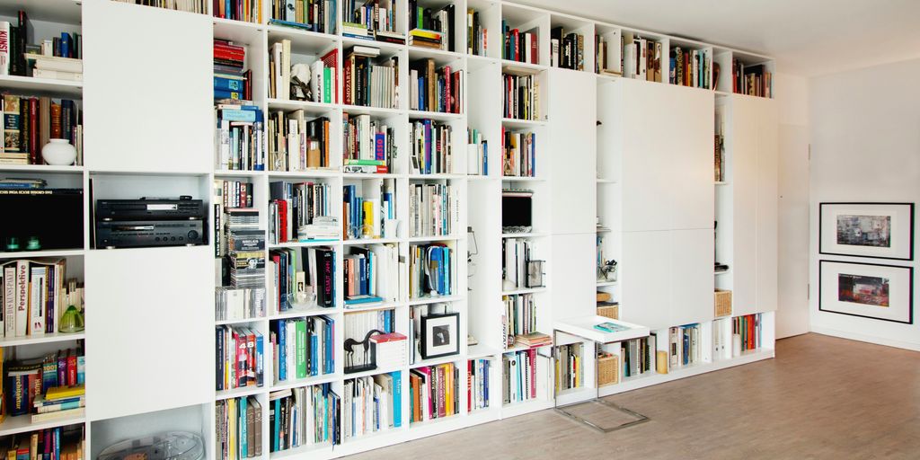 white wooden book shelf with books