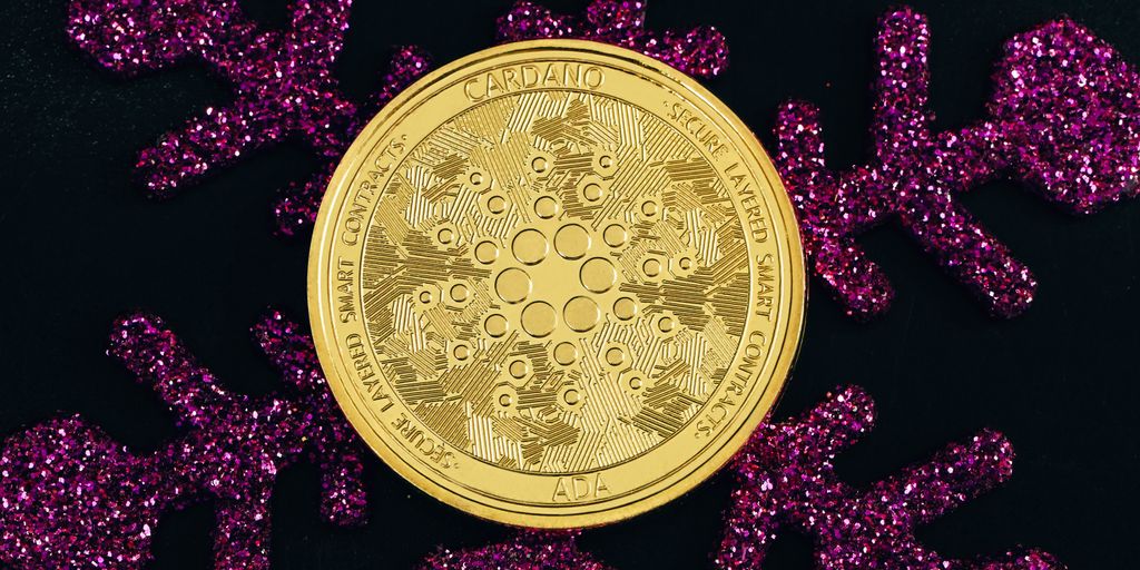 a close up of a gold coin surrounded by purple glitter