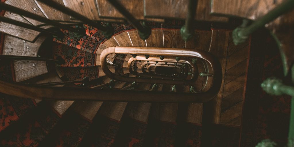 brown and green metal handrails