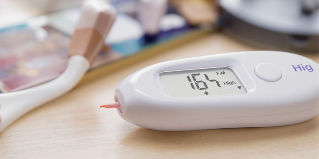Blood glucose meter indicating high blood sugar levels.