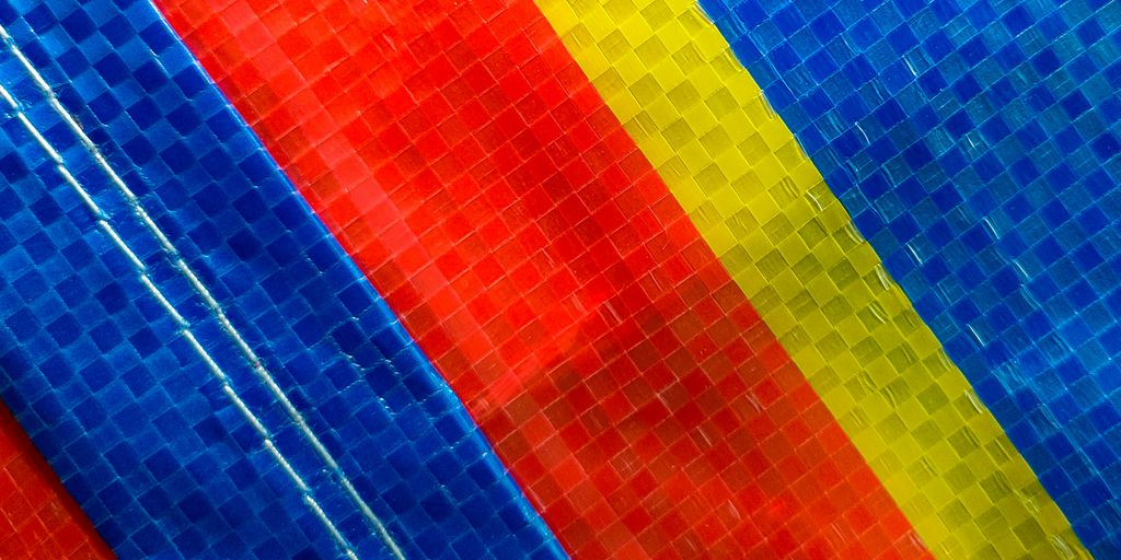 a close up of a rainbow colored wall