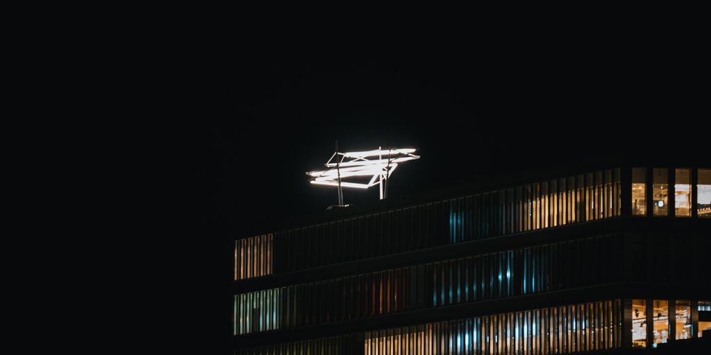 a helicopter flying over a building