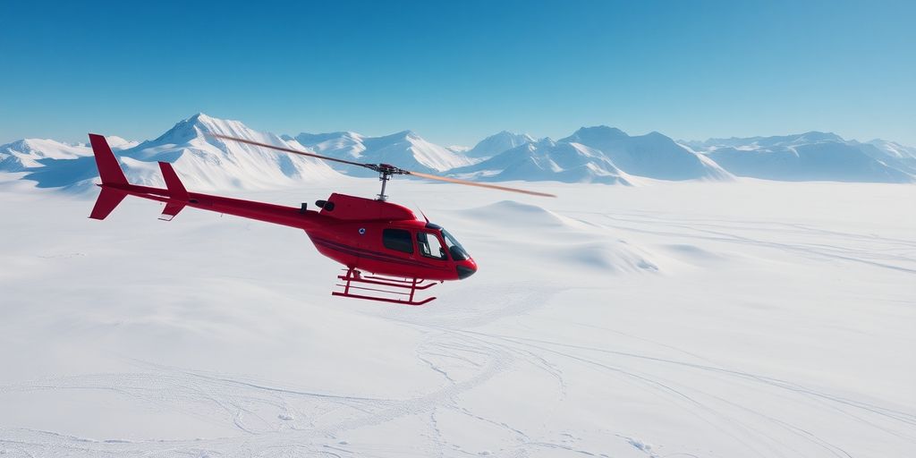 A red helicopter flying over a massive Alaskan glacier.