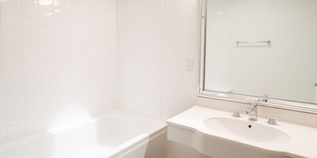 Sparkling clean bathroom with gleaming fixtures.