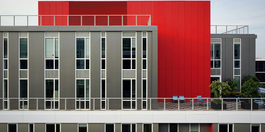 aerial photography of red and gray building