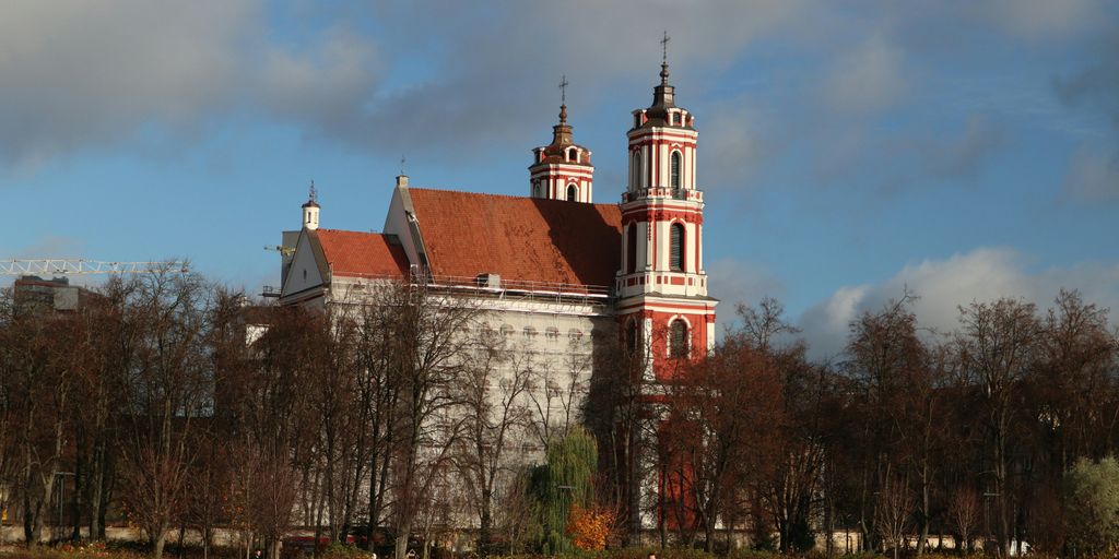a large white building with a red roof
