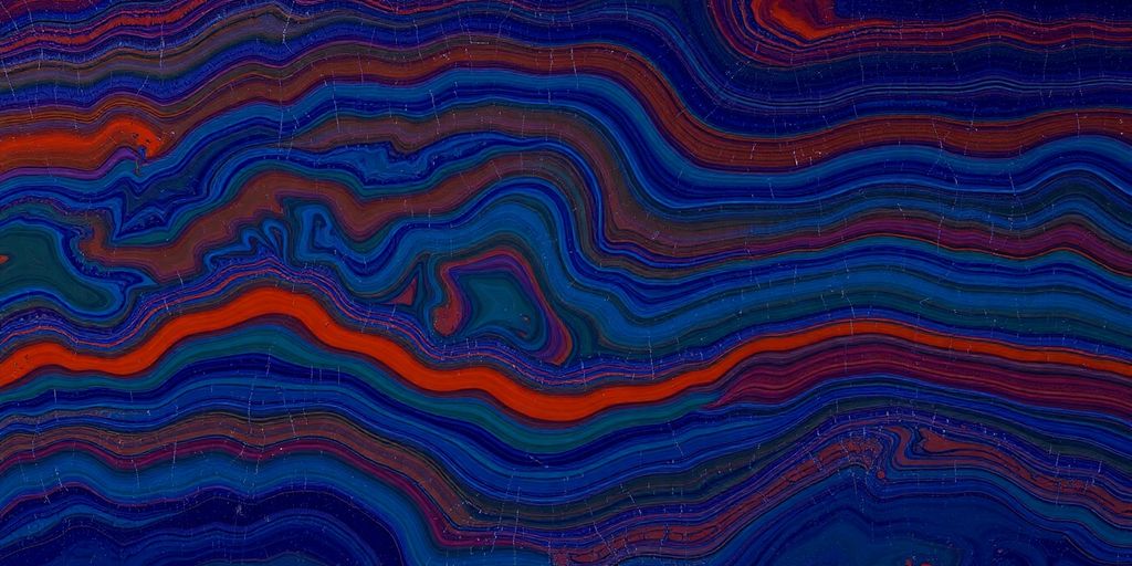 Onyx rainbow slab with vibrant, swirling colors.