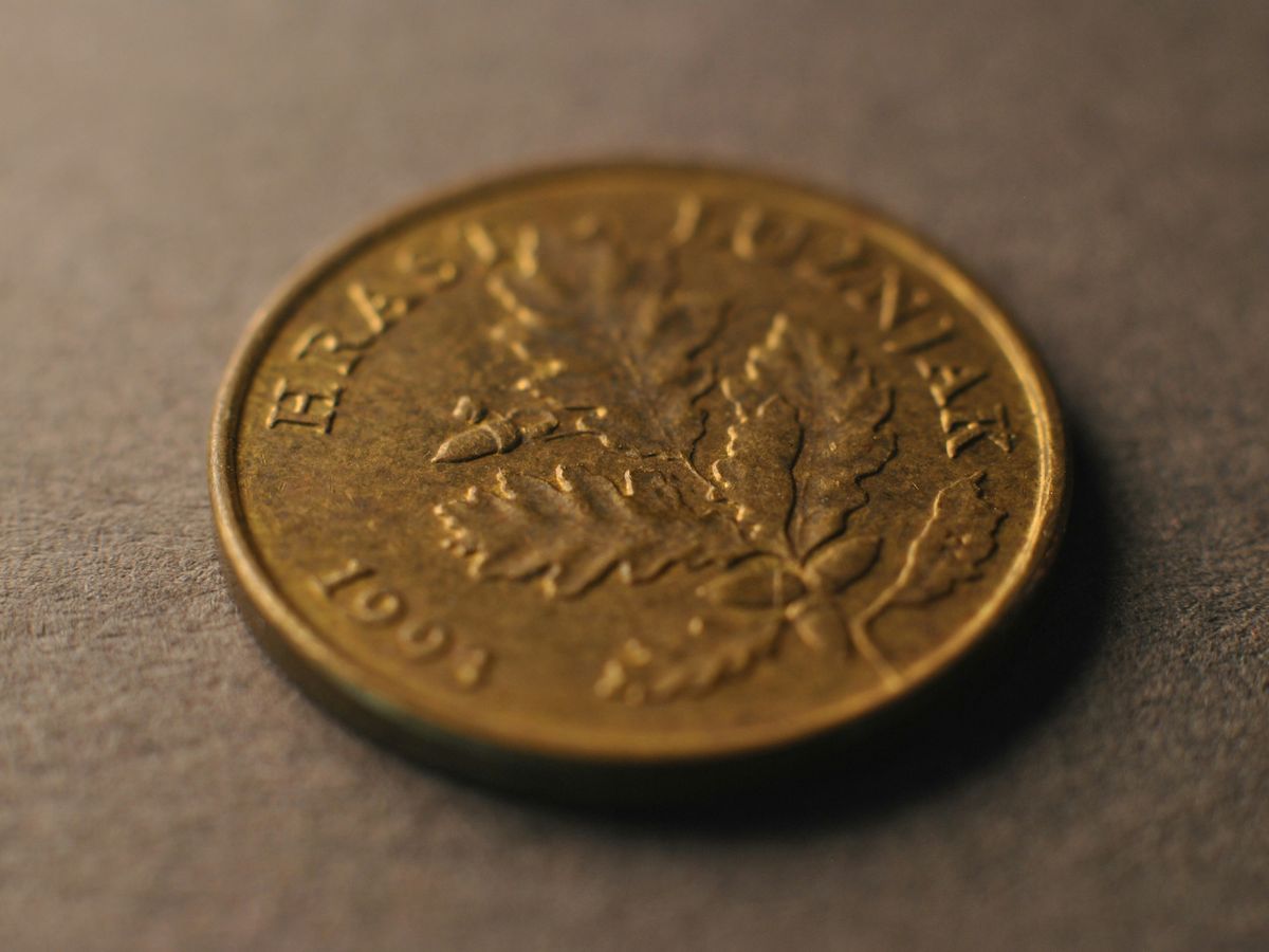 A close up of a coin on a table