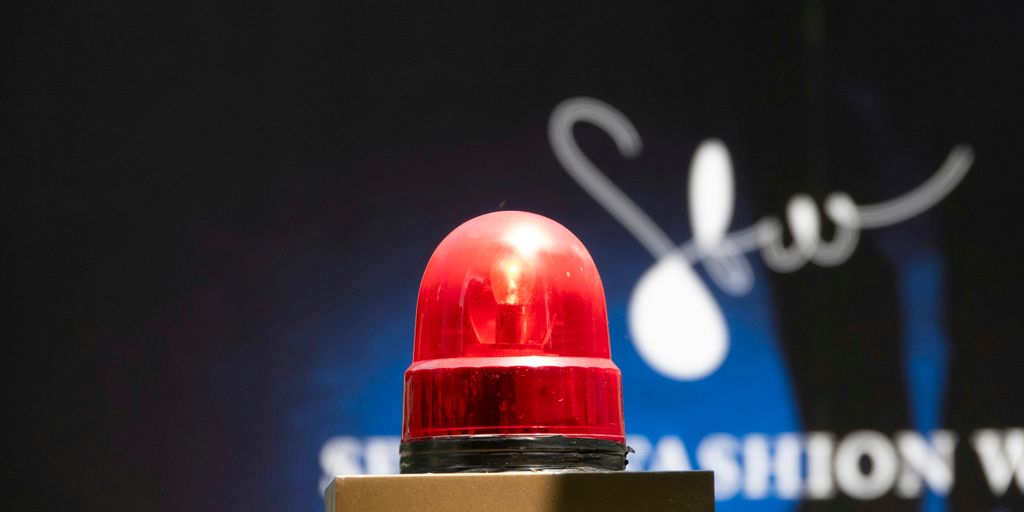 a red light sitting on top of a table