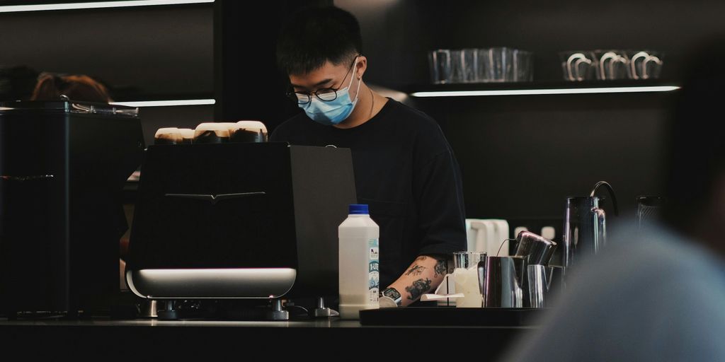 a man sitting in front of a computer