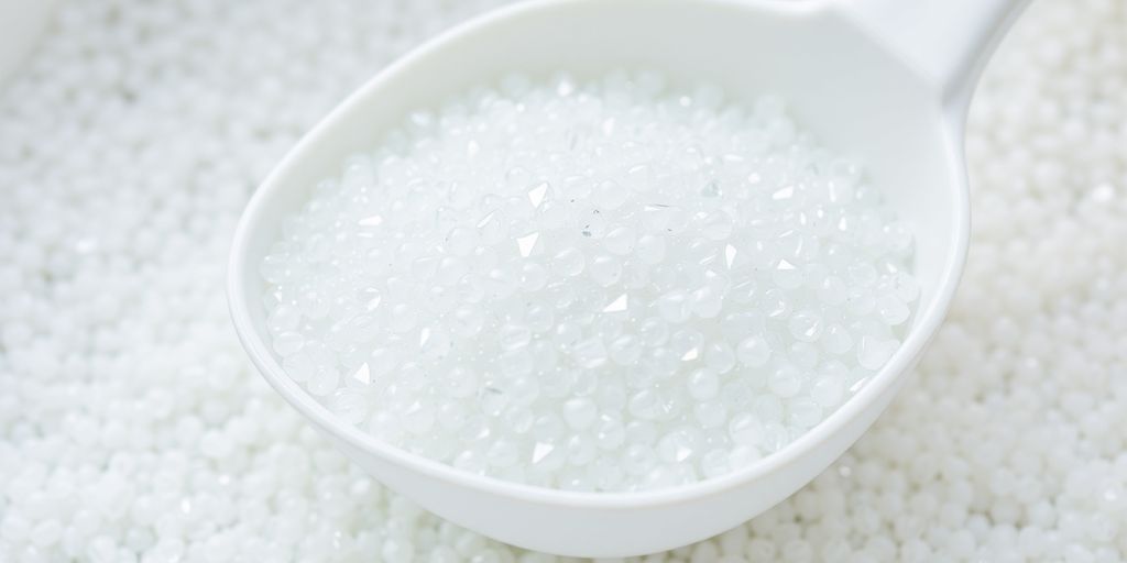 Scoopful of Ultra Pet Litter Pearls Cat Litter.