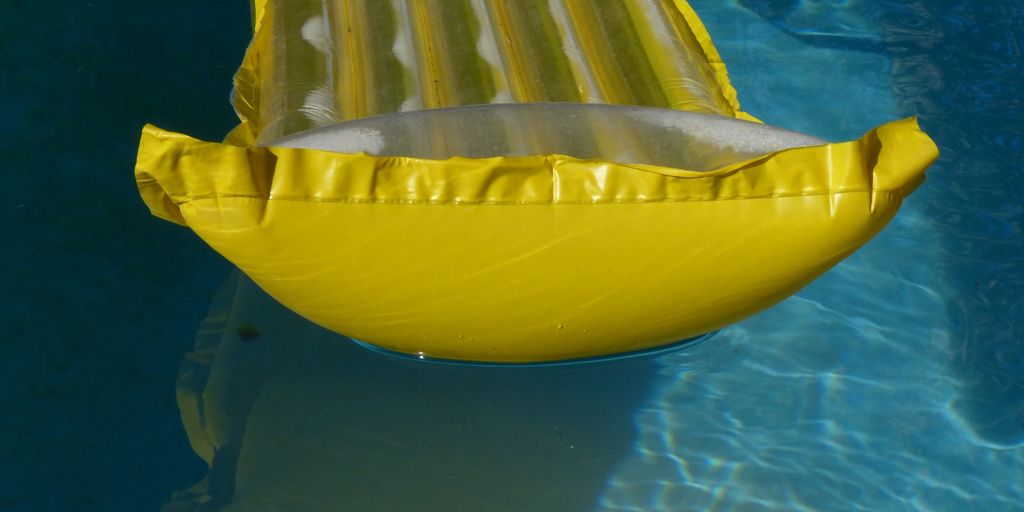 swimmer eating dried cereal poolside