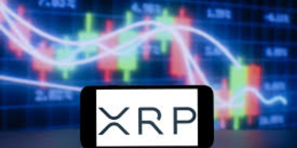 A smartphone displaying the XRP logo with a trading chart background.