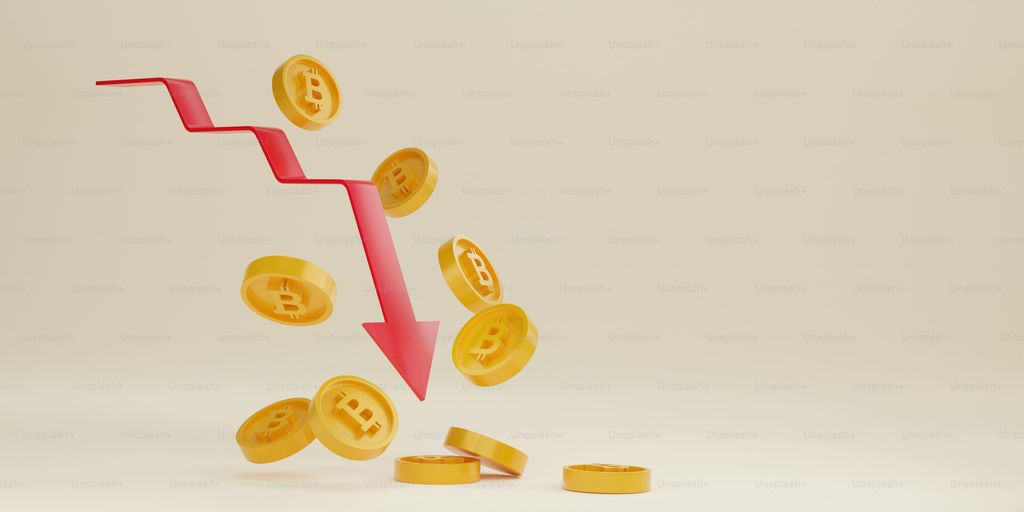 Bitcoin coins falling with a downward trending arrow in background.