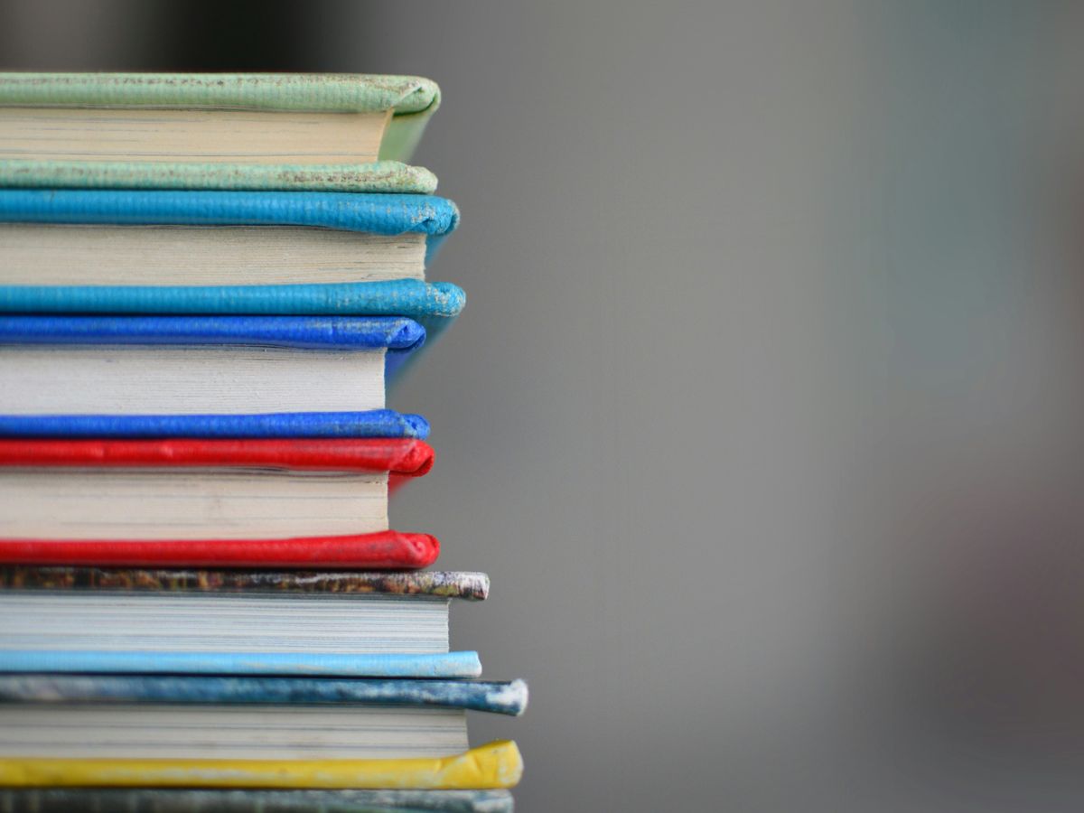 shallow focus photography of books
