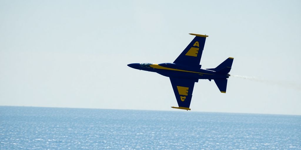 Blue Angels jet performing aerobatics over water.