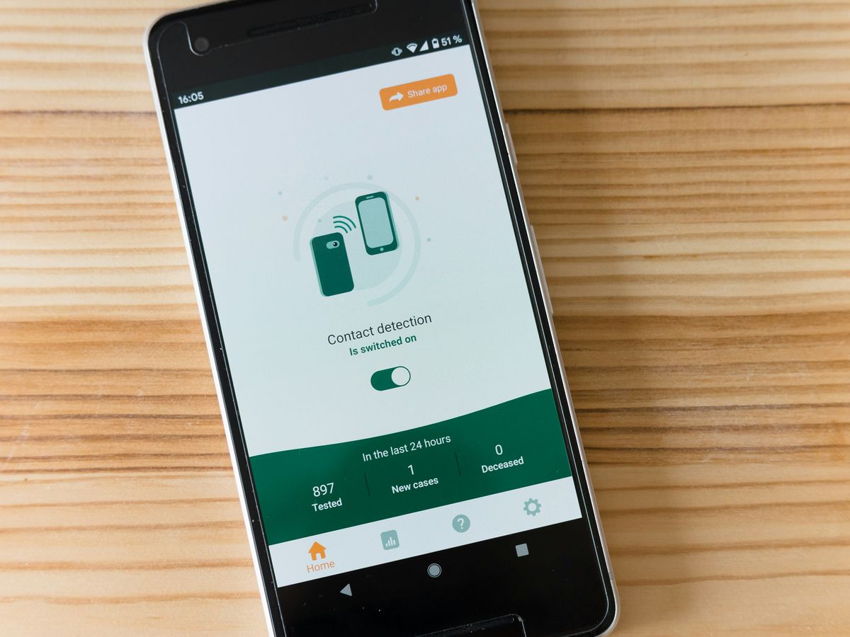 black samsung android smartphone on brown wooden table