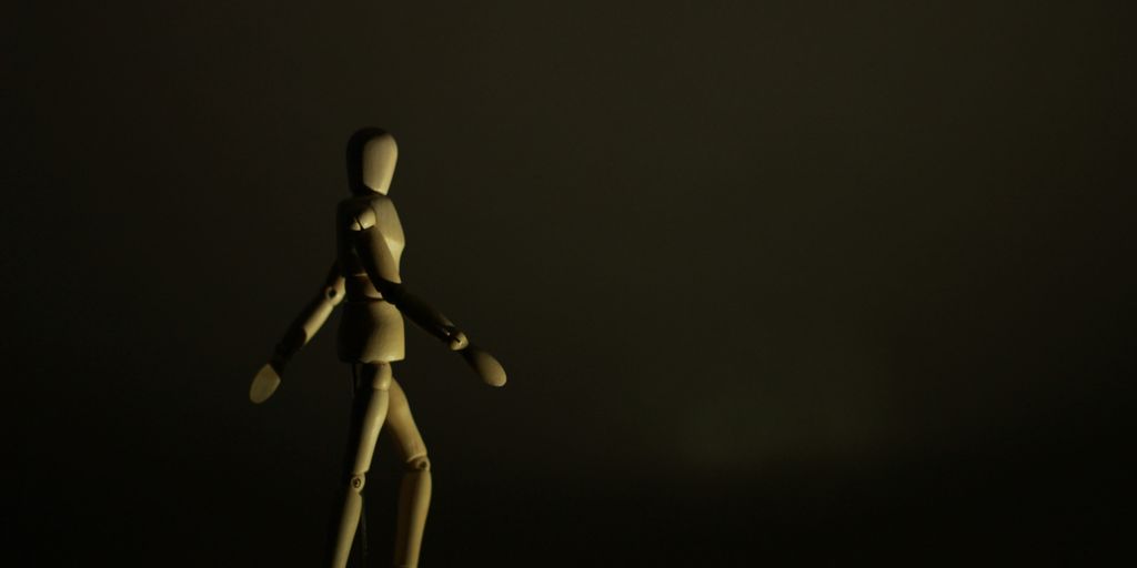 brown stickman figurine