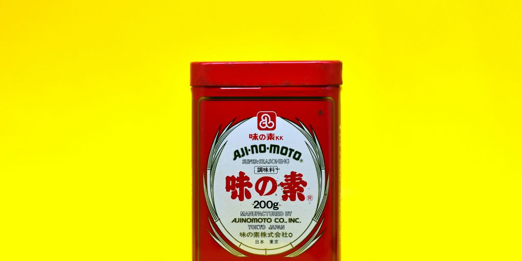 a tin of food on a yellow background