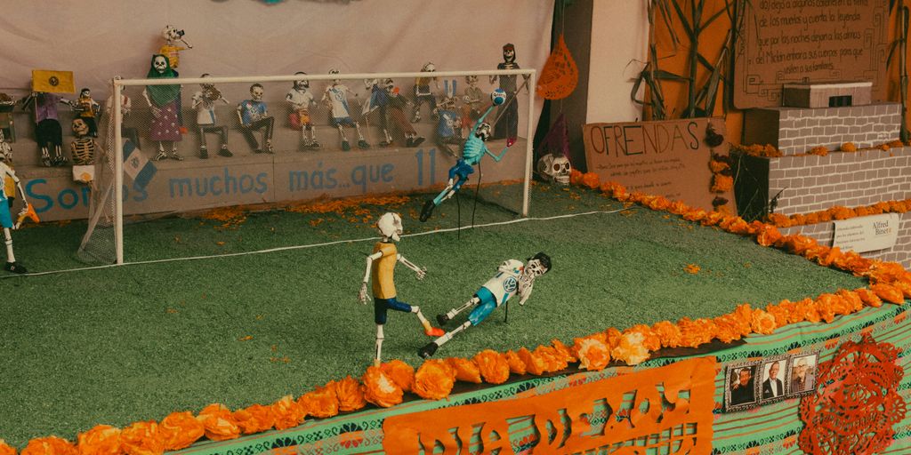 a group of people playing a game of soccer