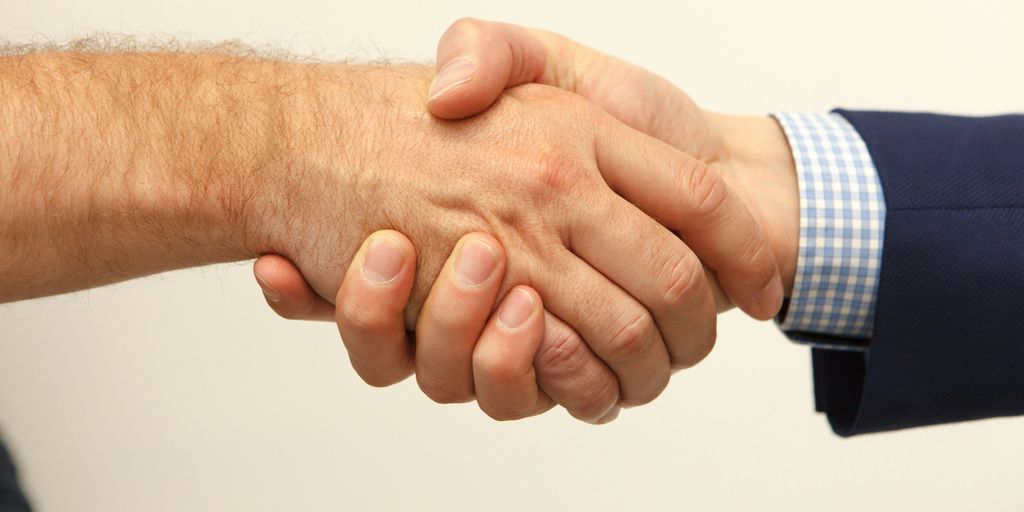 man and woman holding hands