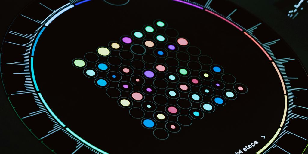 A close up of a clock on a black surface