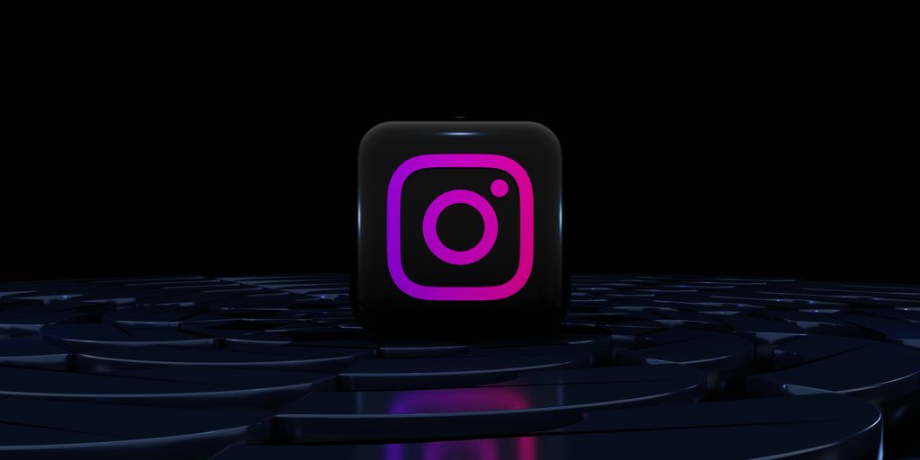 a purple instagram logo on a black background