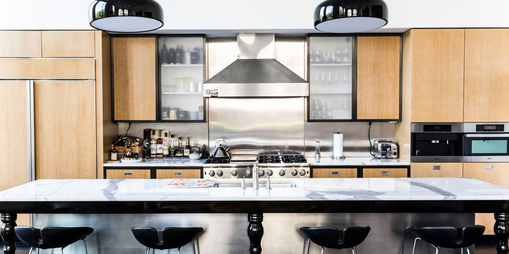 How Much Does a Kitchen Remodel Cost in Mississauga? A Transparent Breakdown white and black dining table