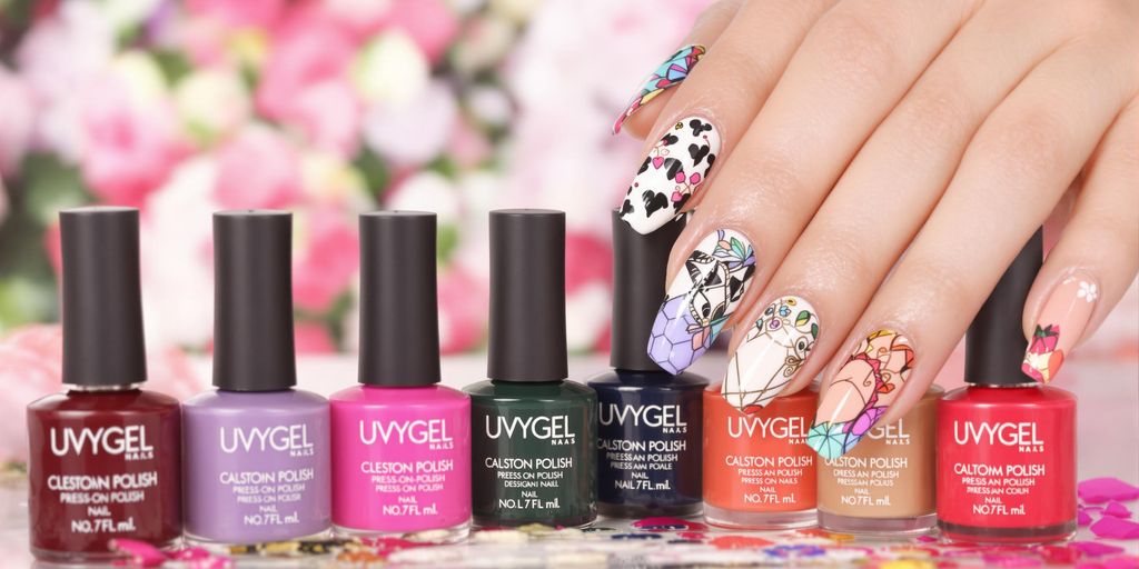 Colorful nail polishes alongside a decorative manicure display.