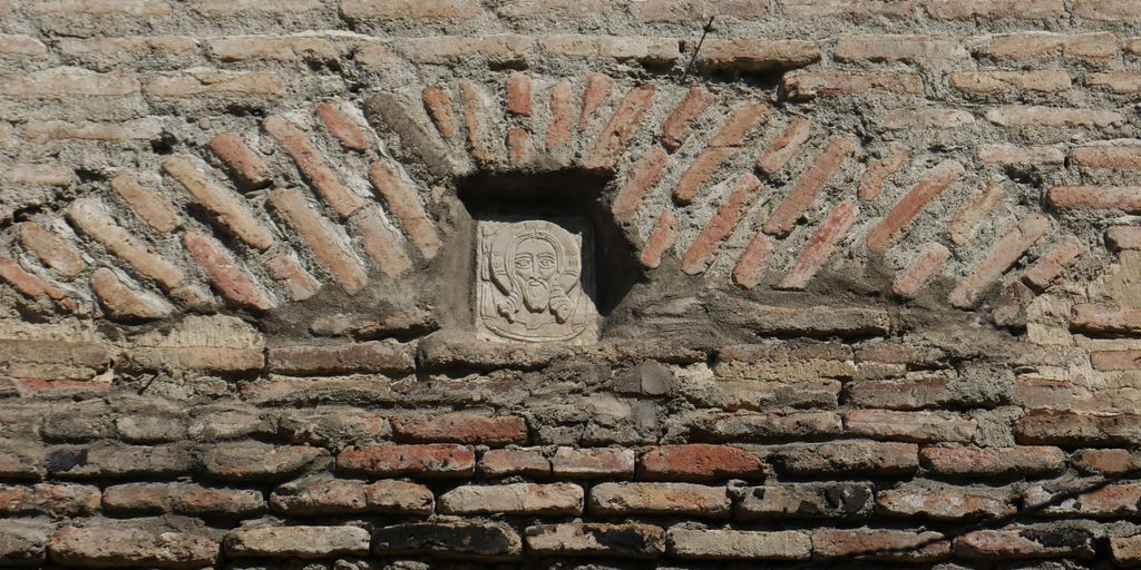 brown brick wall during daytime