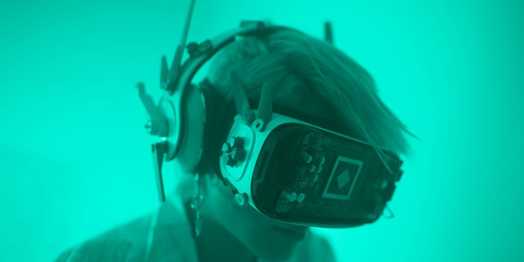 a man wearing a pair of headphones and a headset
