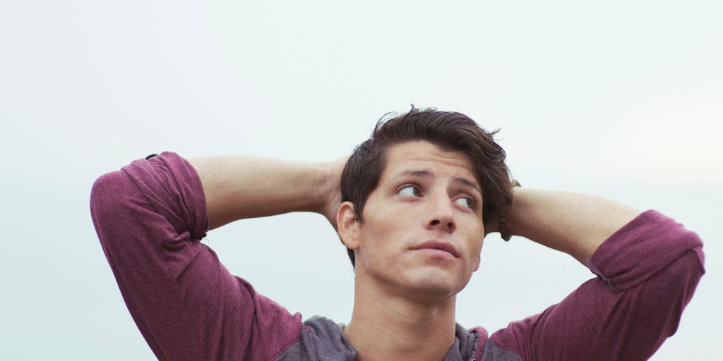 man holding his head