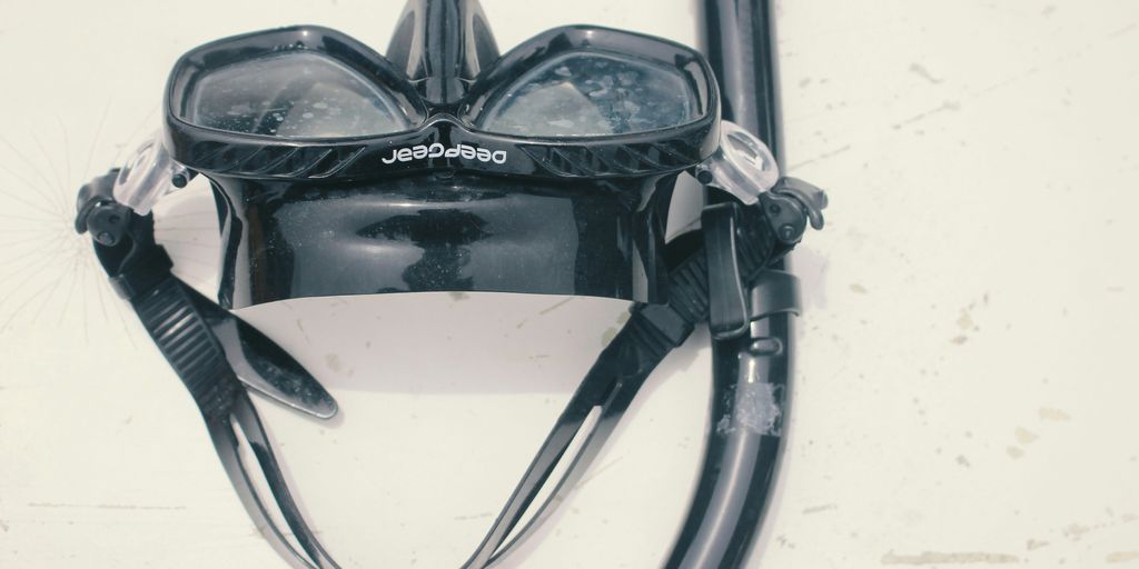 a pair of diving goggles attached to a diving device