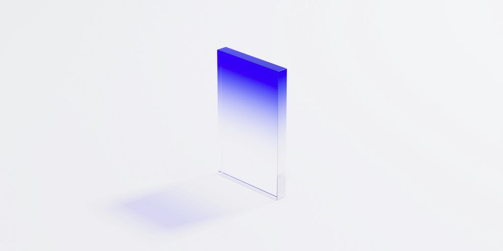 a blue and white square shaped object on a white surface